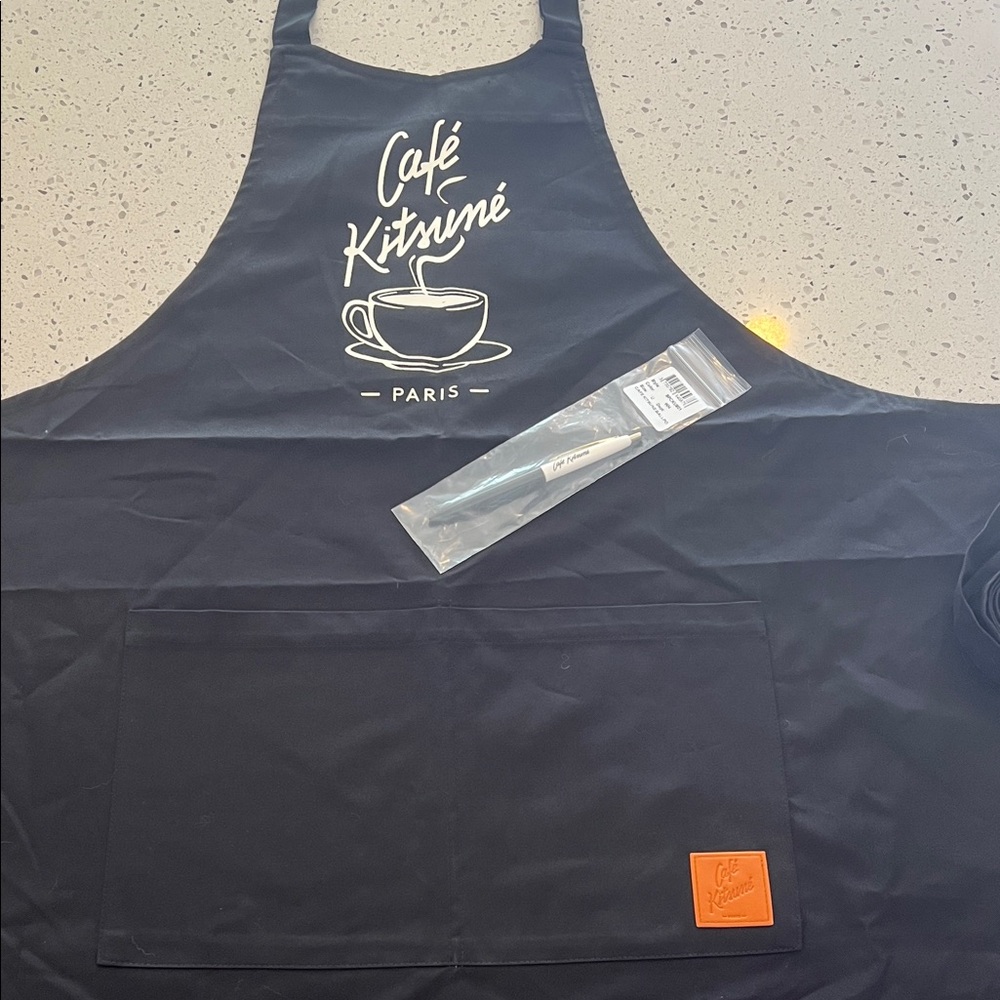 Cafe Kitsune Apron with coffee cup logo